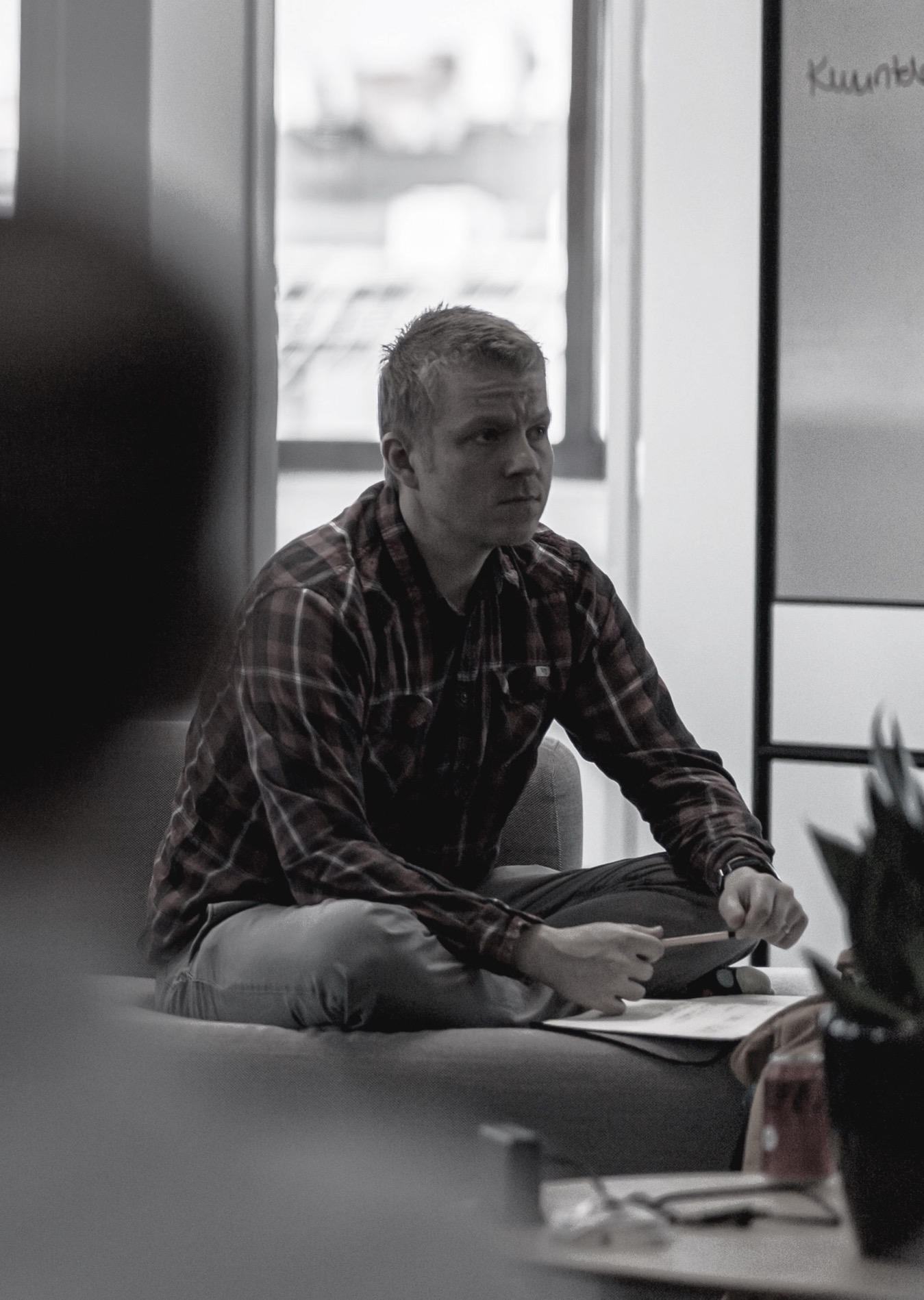 Picture of Aleksis Tulonen sitting with a laptop on his lap